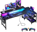 Gaming desk featuring USB charging ports and LED lights.