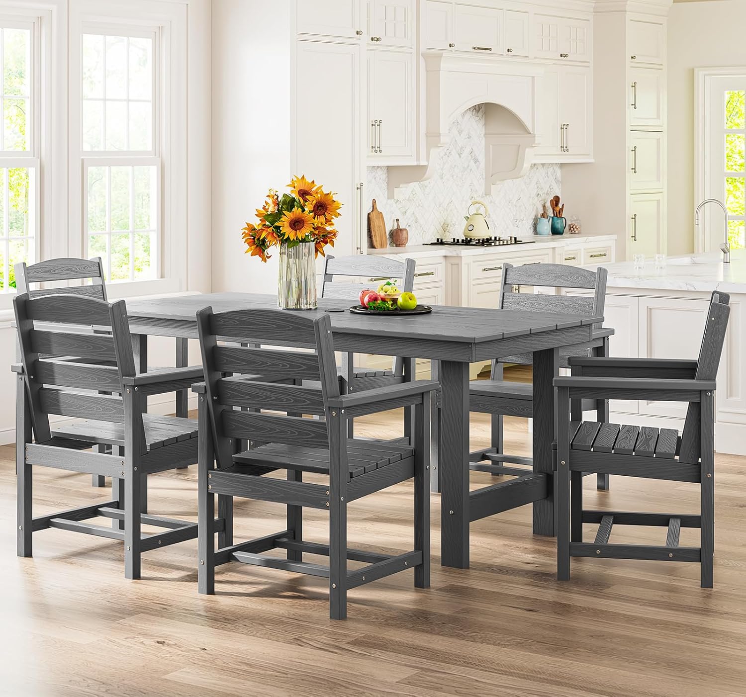 Dining table and chair set. 7-piece outdoor dining set, including a table with an umbrella hole and six chairs.