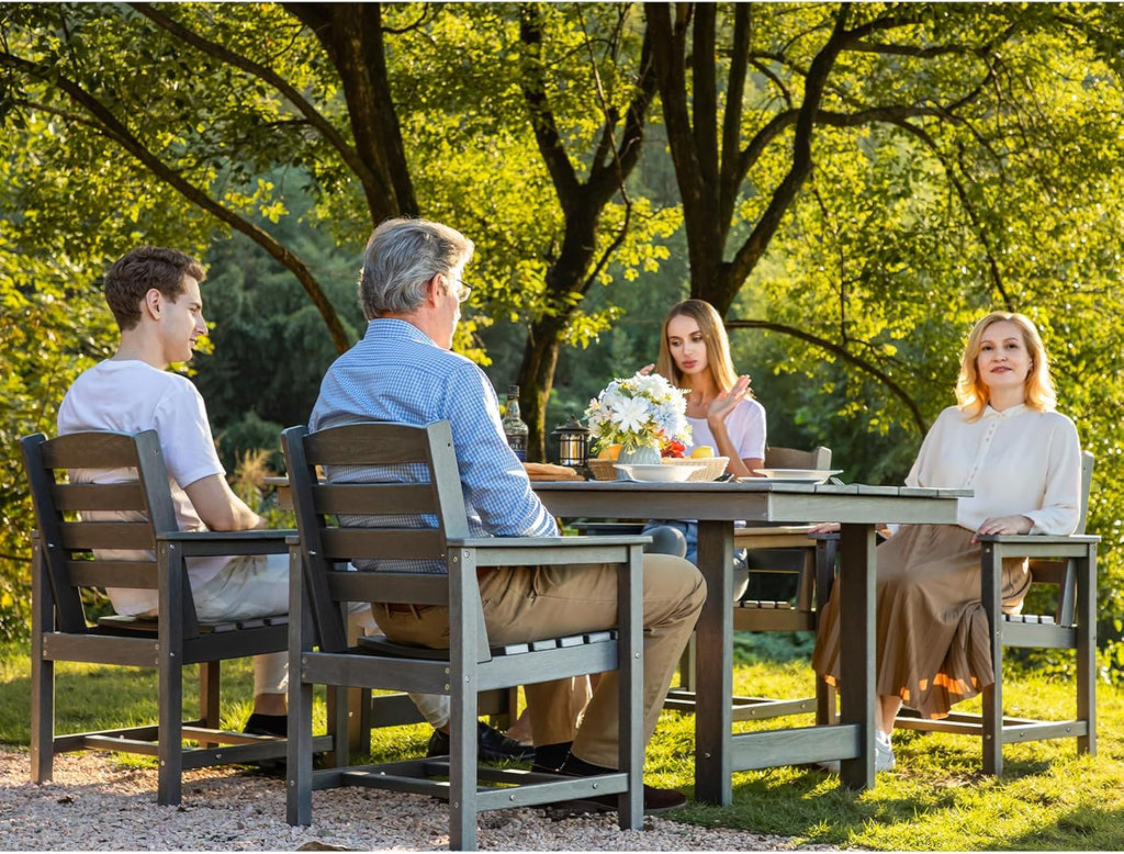 Dining table and chair set. 7-piece outdoor dining set, including a table with an umbrella hole and six chairs.