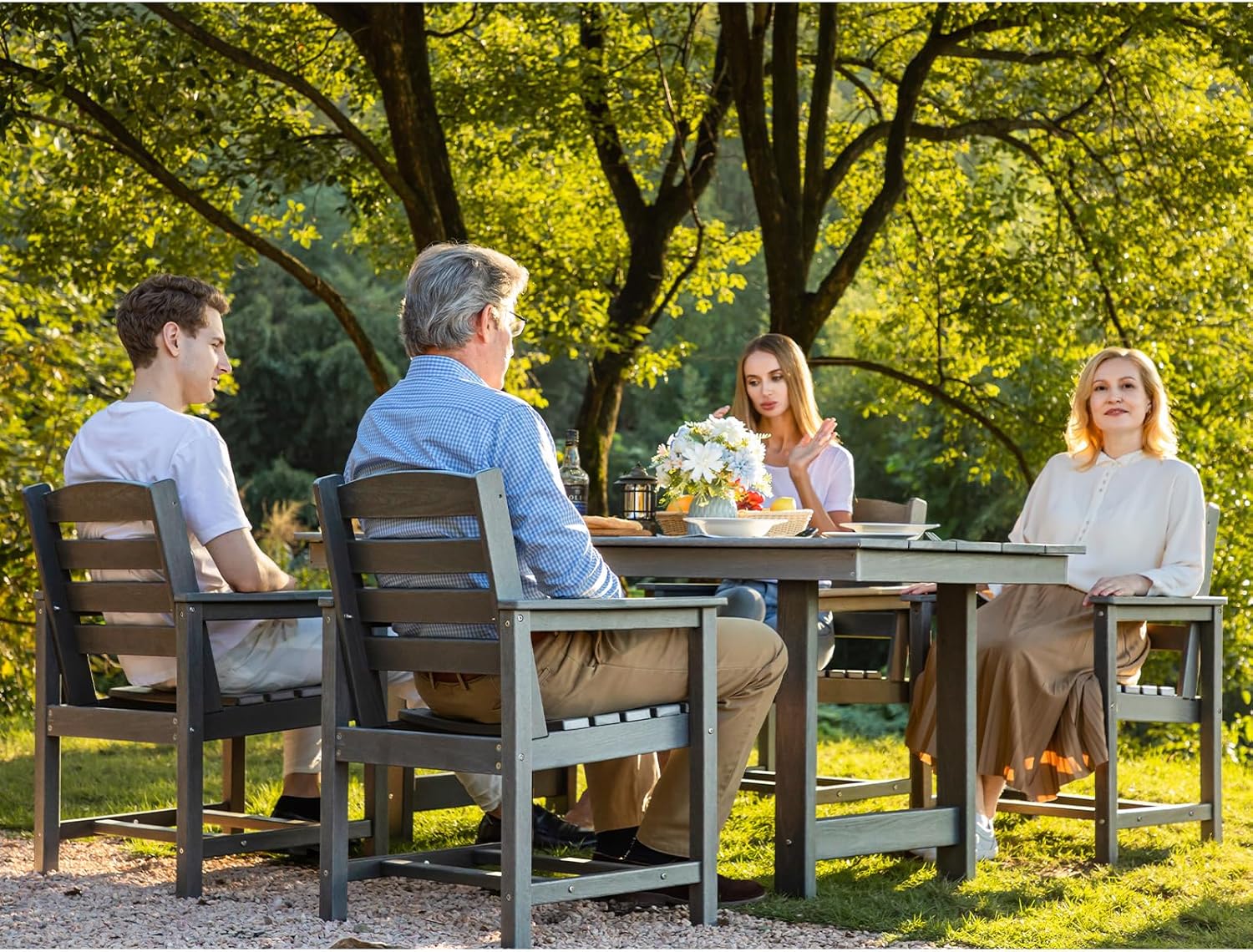 Dining table and chair set. 7-piece outdoor dining set, including a table with an umbrella hole and six chairs.